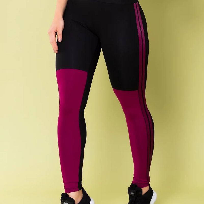 Calça legging energy preta com recorte e elástico roxo