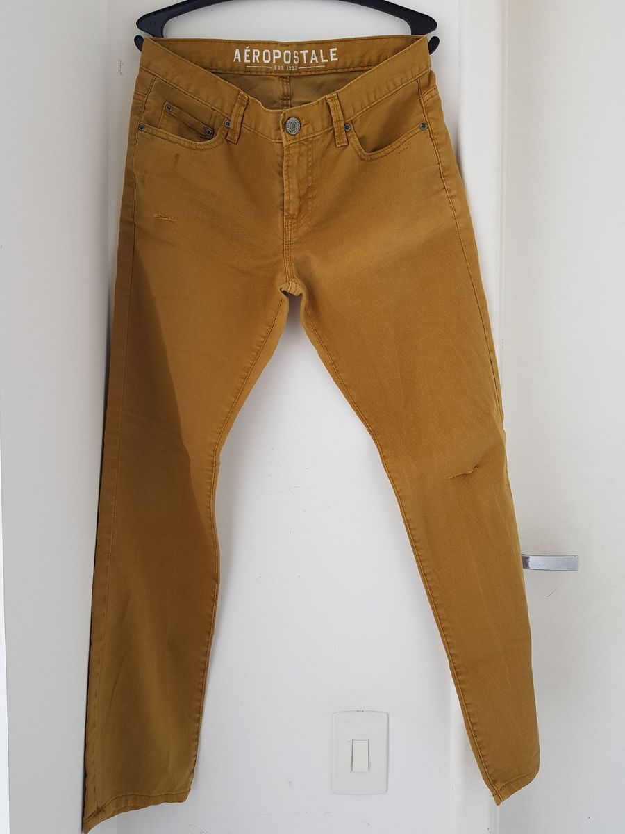 calça jeans masculina mostarda