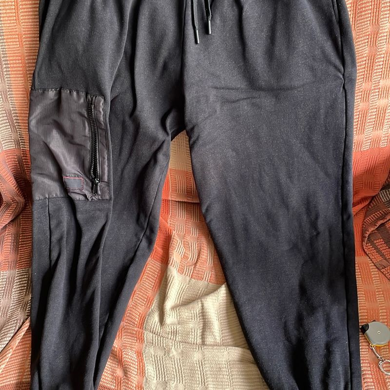 Calça moletom masculina com ziper best sale na perna