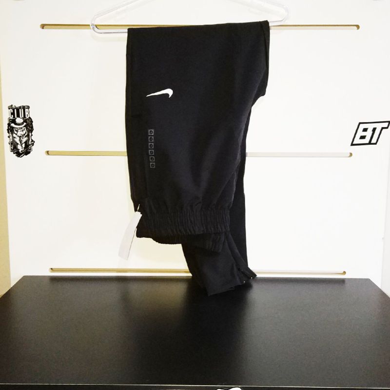 Calça nike com ziper na 2024 barra feminina