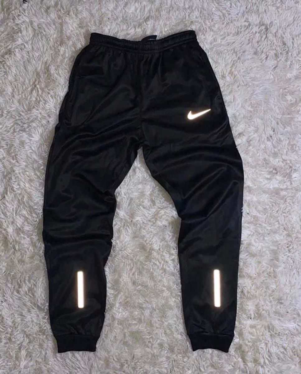 calça corta vento nike