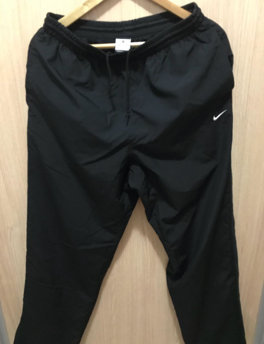 calça nike com elastico na barra