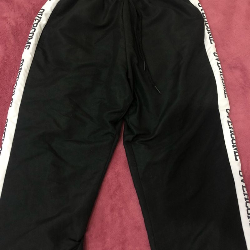 Calça best sale tactel overcome