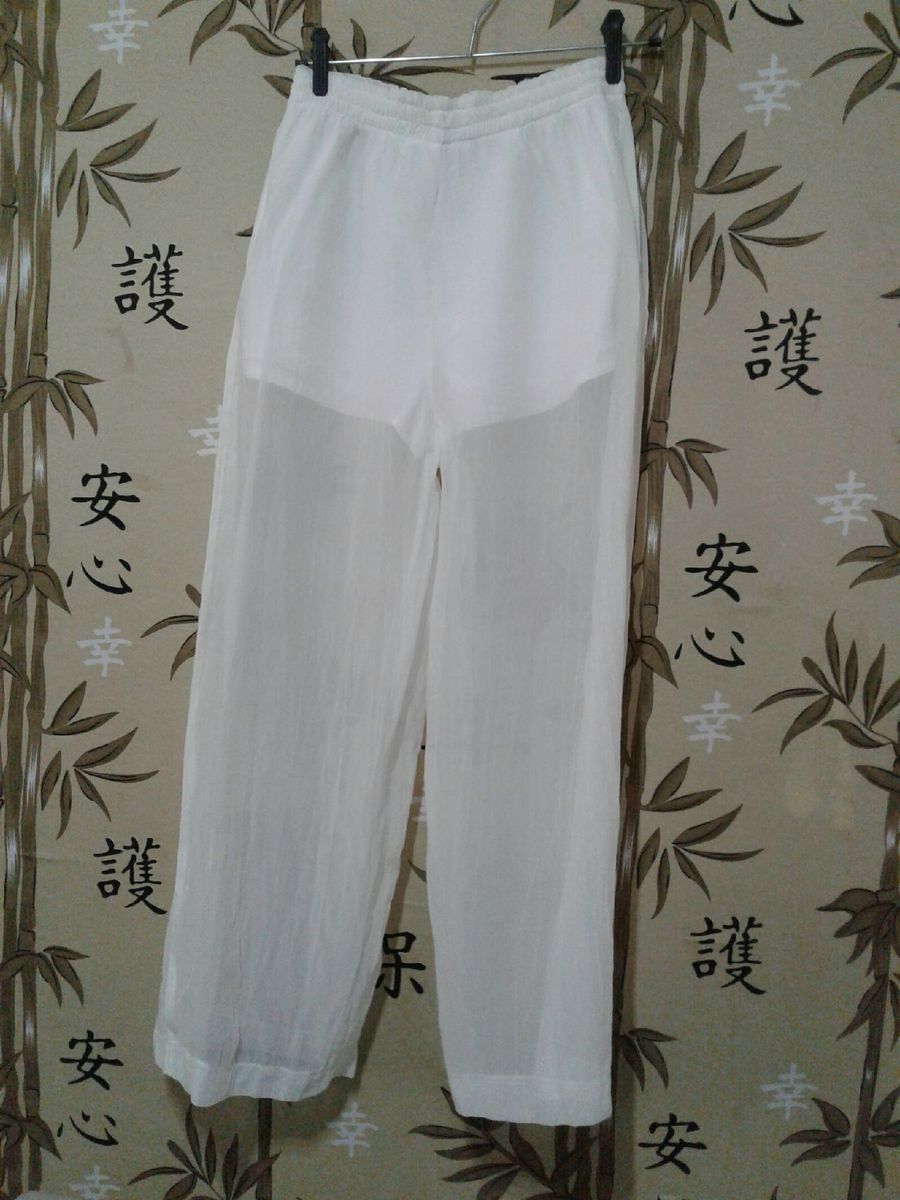 calça pantalona transparente