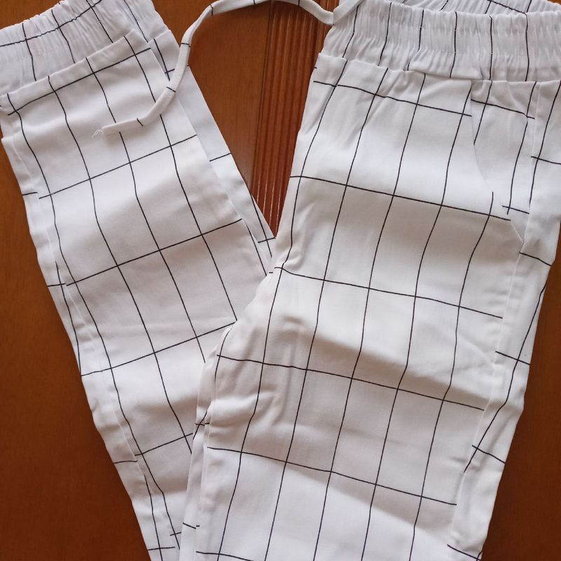 Calça store xadrez grid