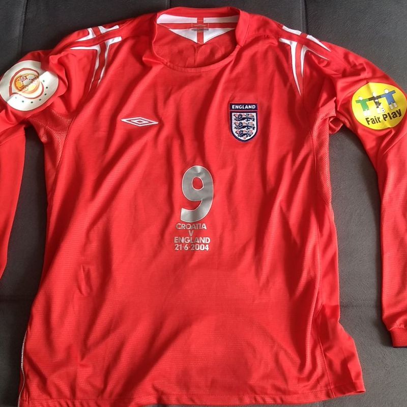 Camisa Manga Longa Oficial da Inglaterra Umbro Preparada para Jogo