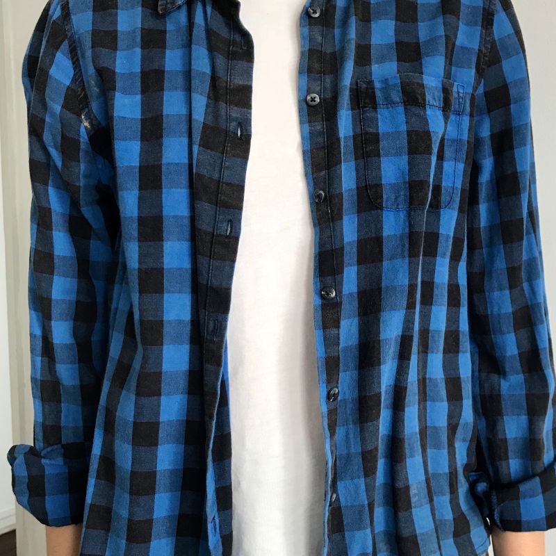 Camisa xadrez store preta e azul