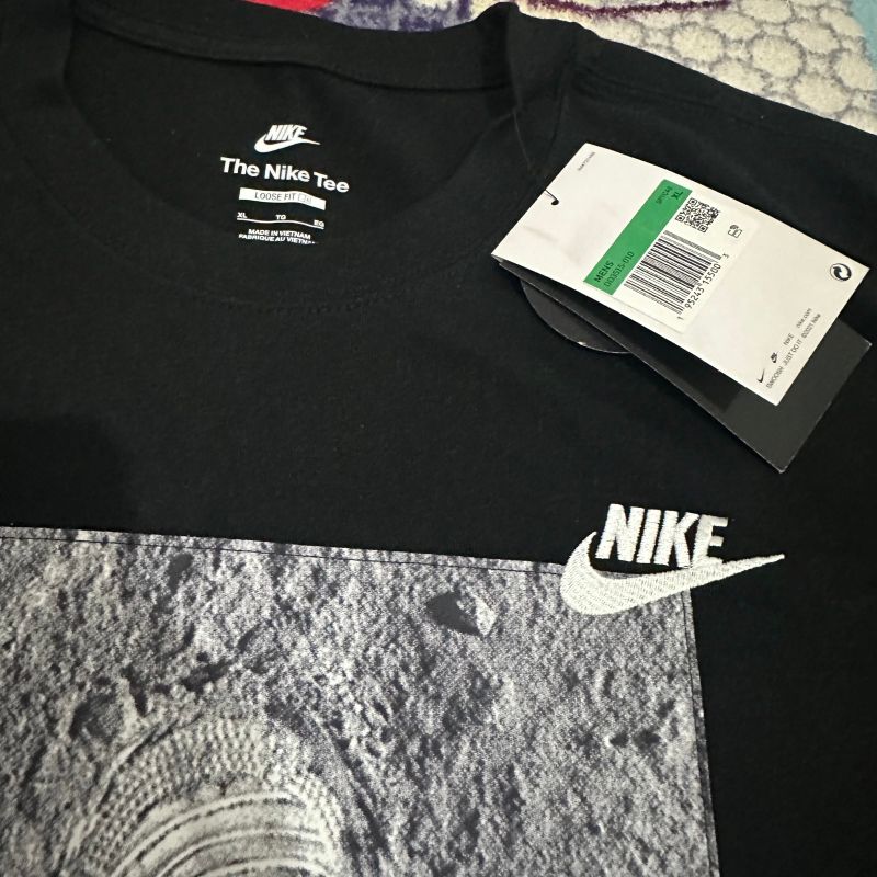 Nike spaceman hotsell t shirt