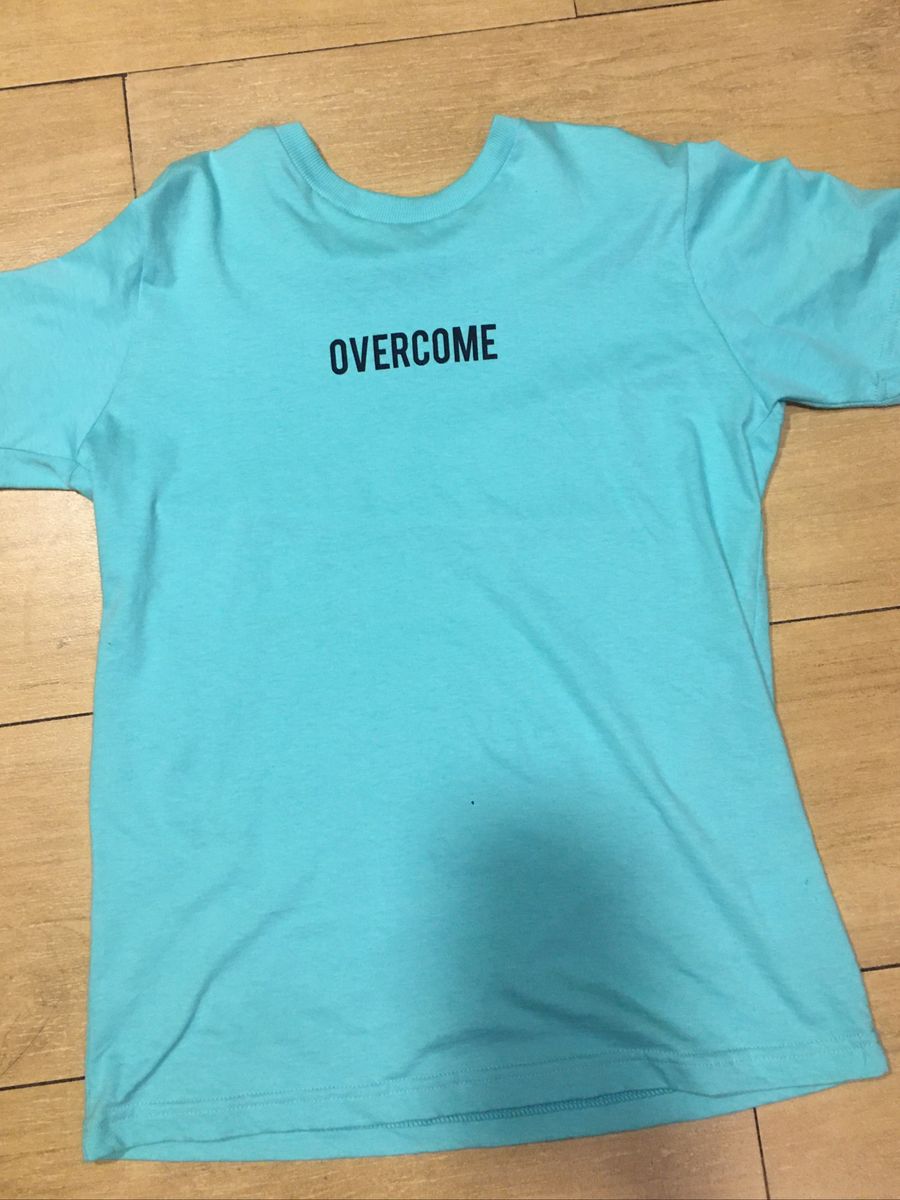 Camiseta overcome hot sale feminina