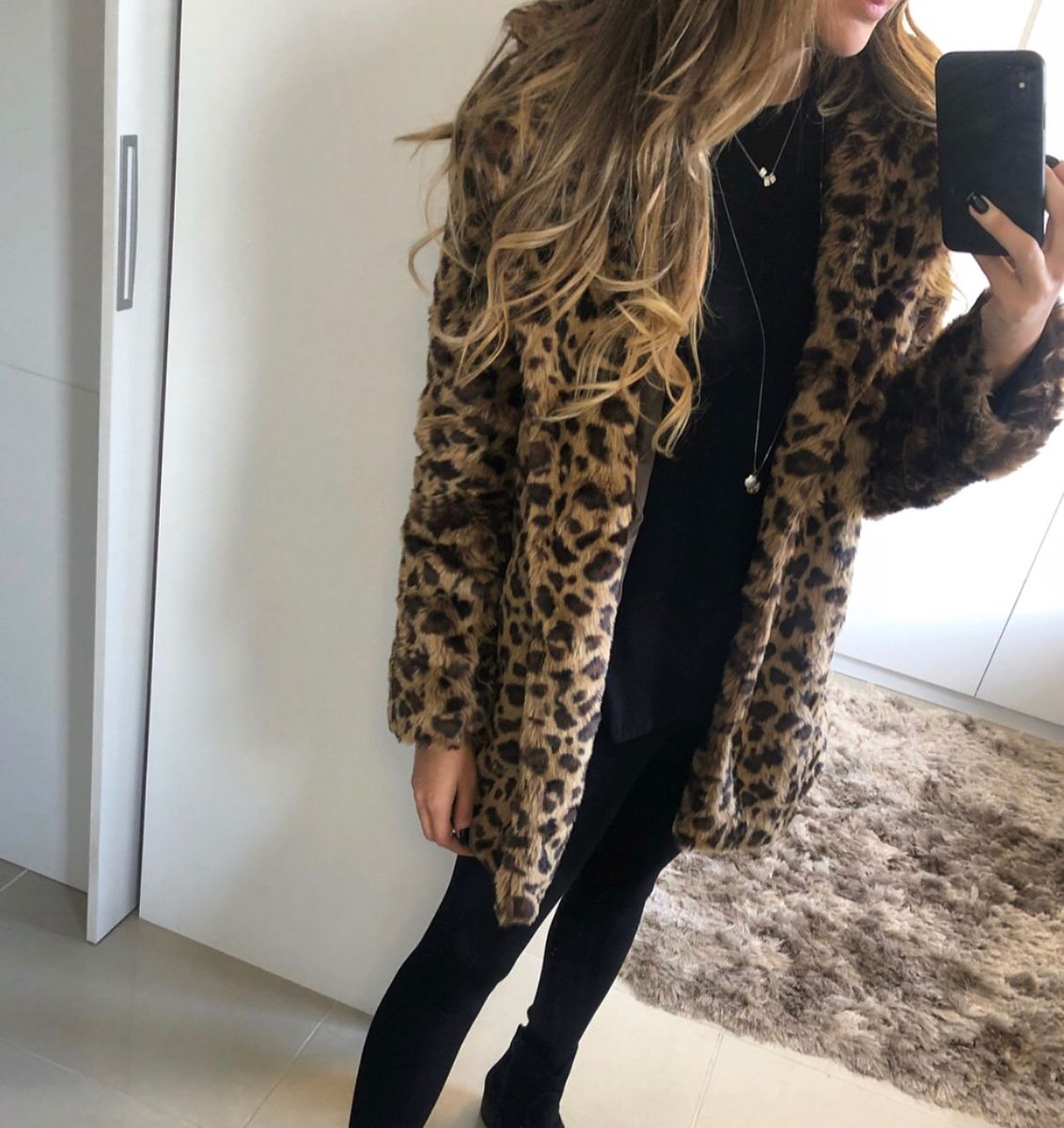 casaco de onça feminino