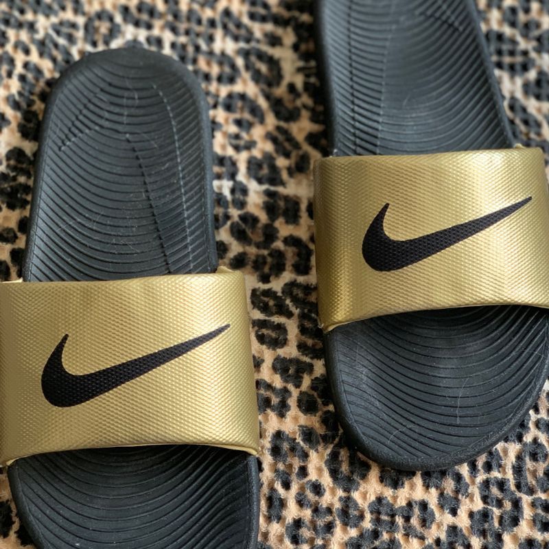 Black and store gold slides nike