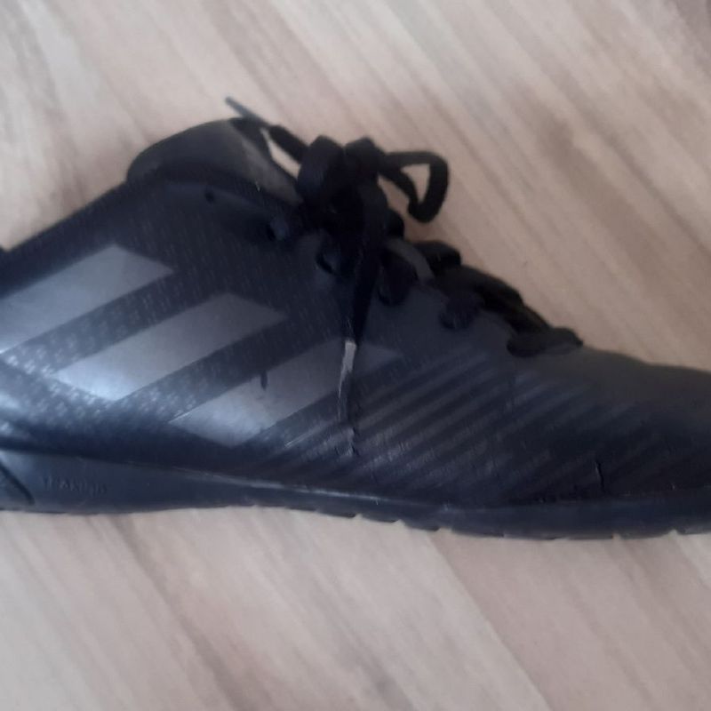 Chuteira adidas 2024 traxion society