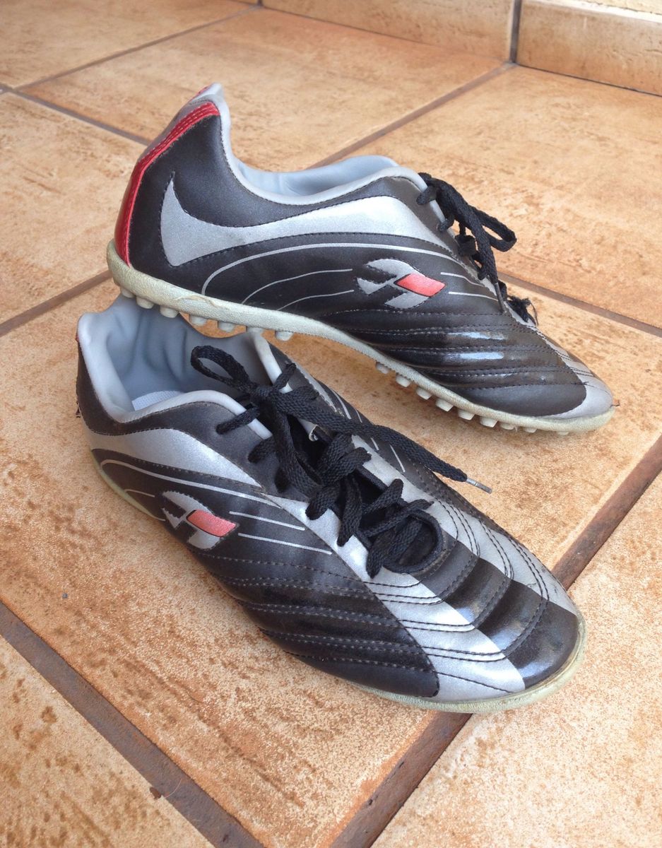 tenis chuteira topper