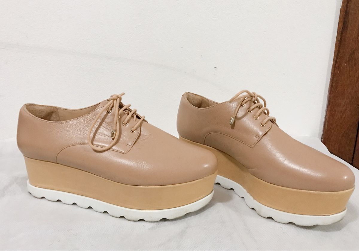 tenis flatform branco arezzo