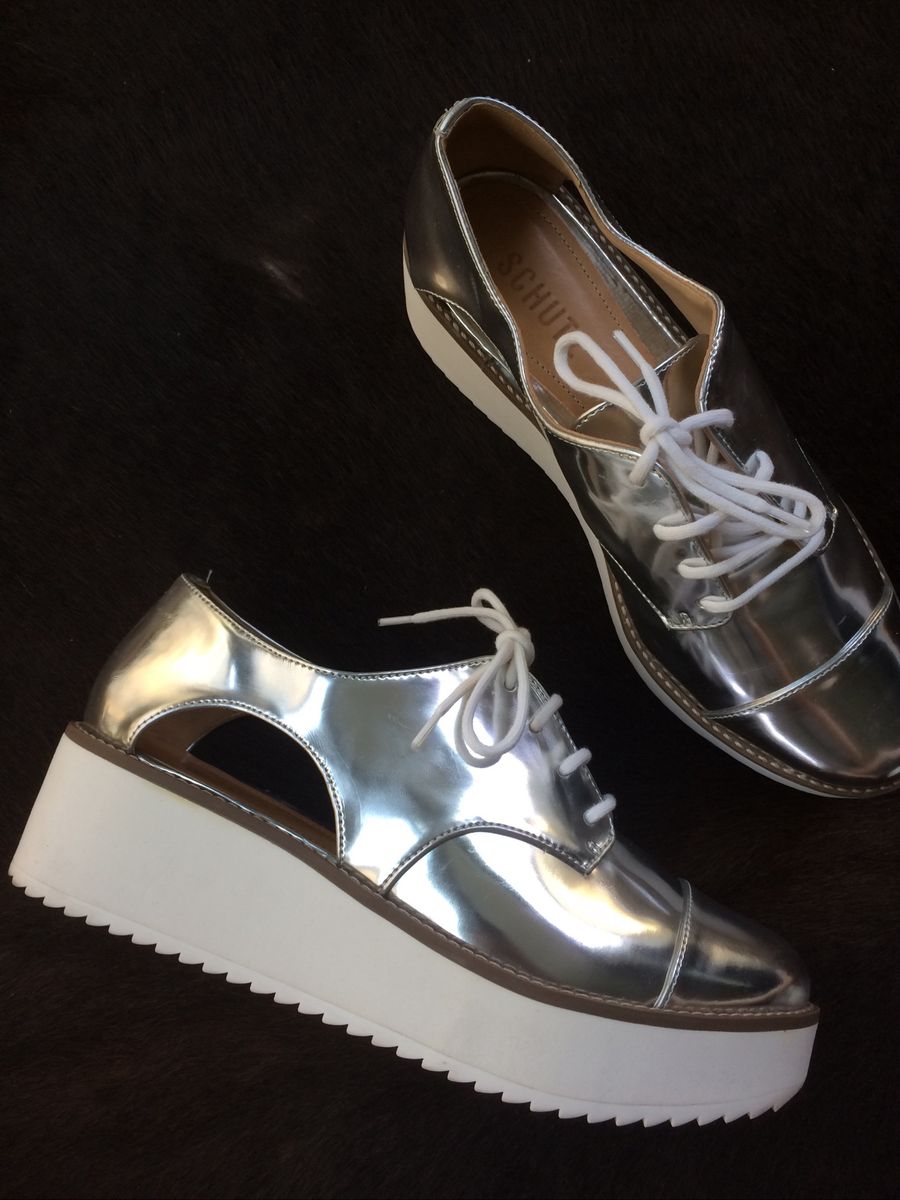 tenis schutz metalizado