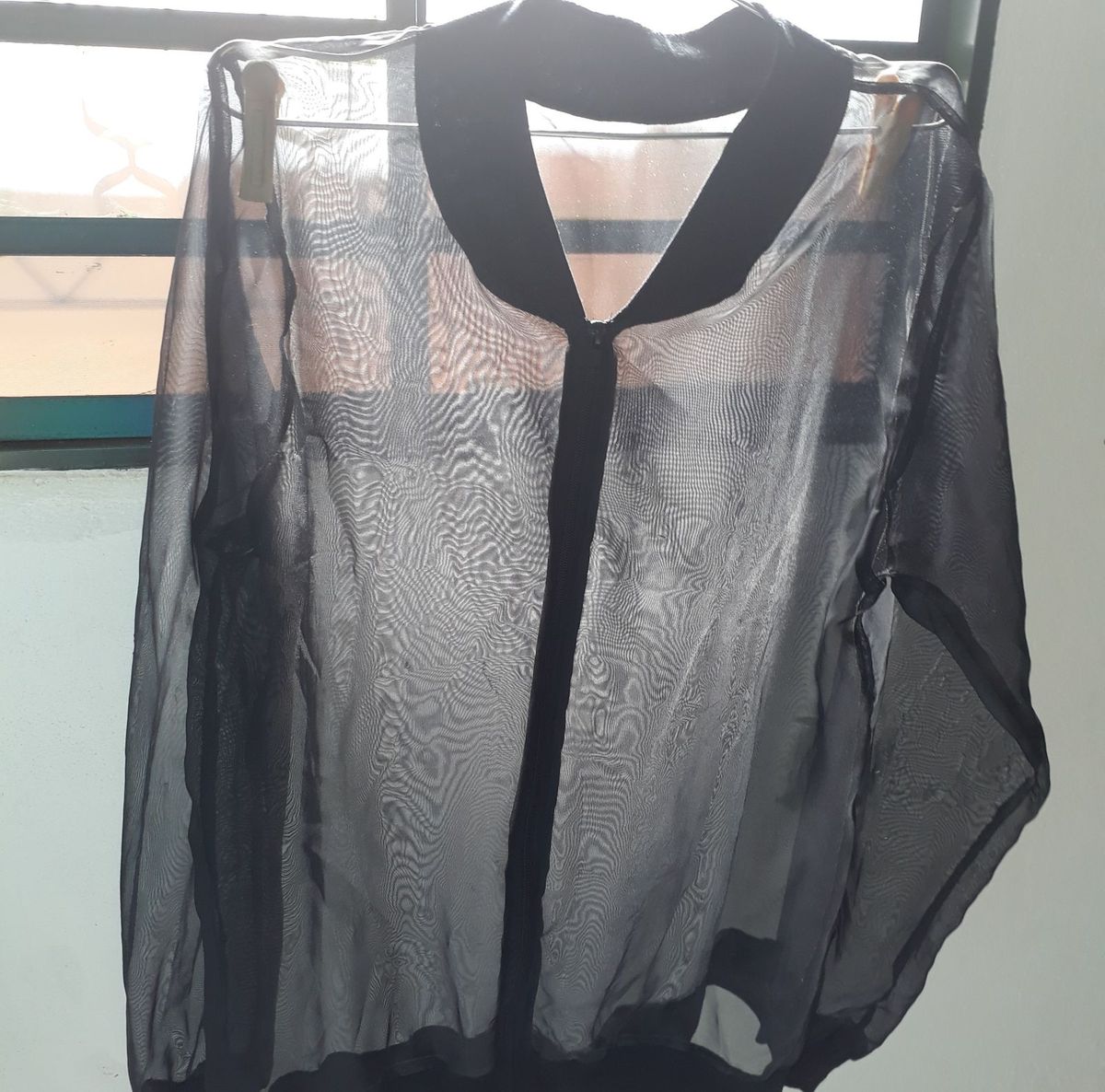 jaqueta preta transparente