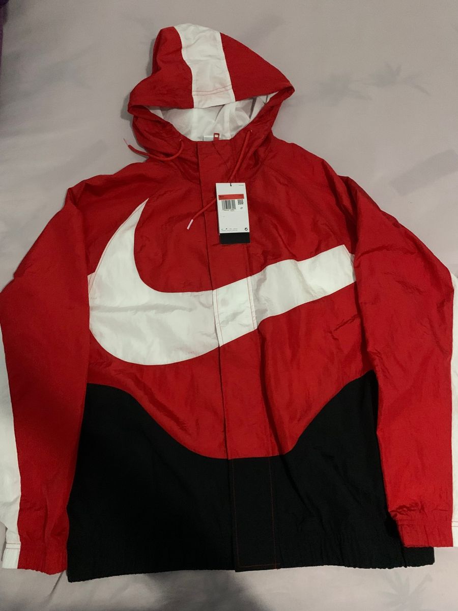 Nike big swoosh store red