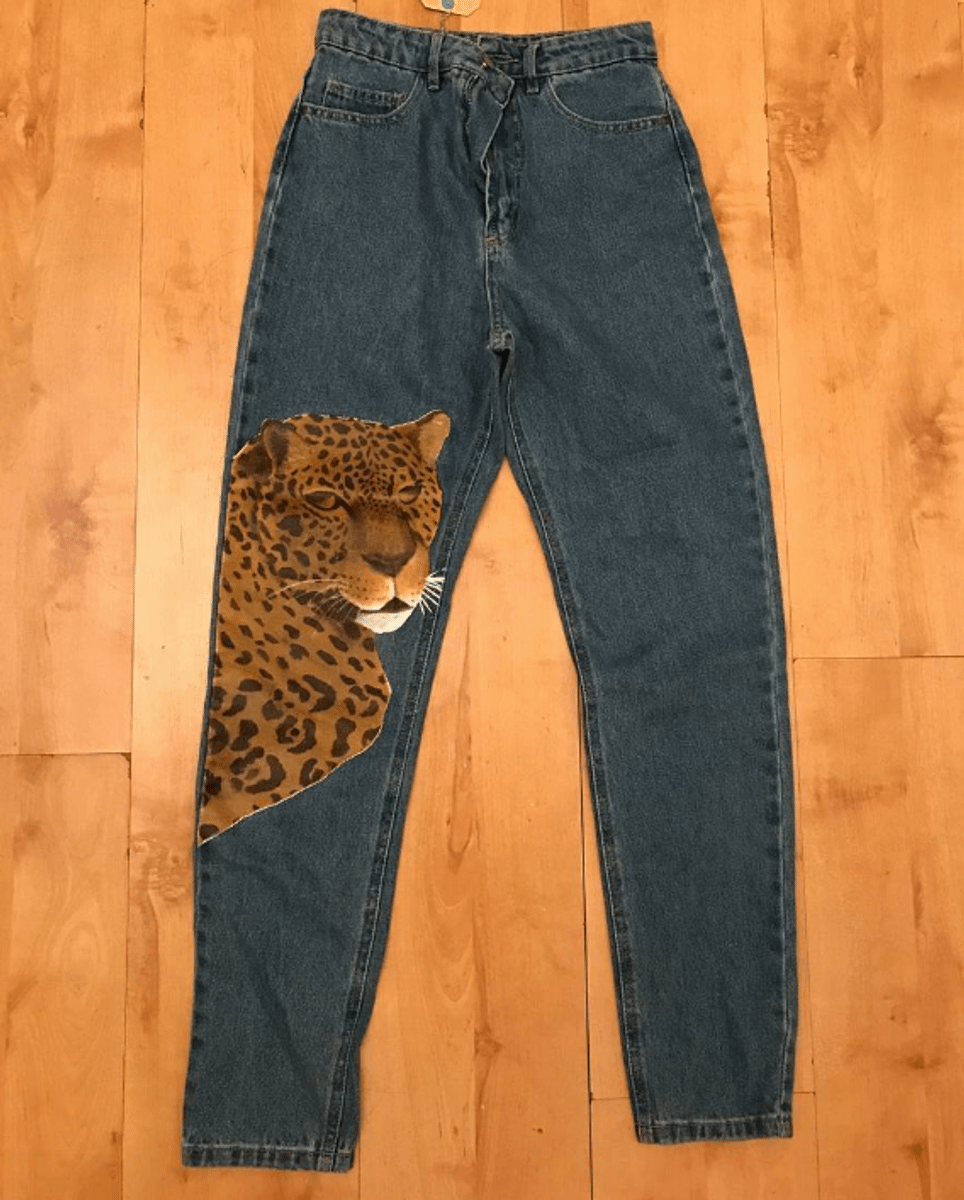 calça jeans de onça