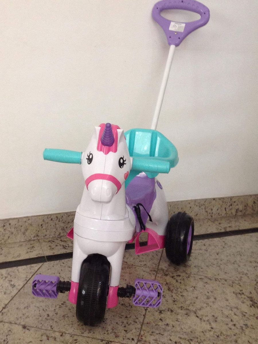 triciclo calesita unicornio