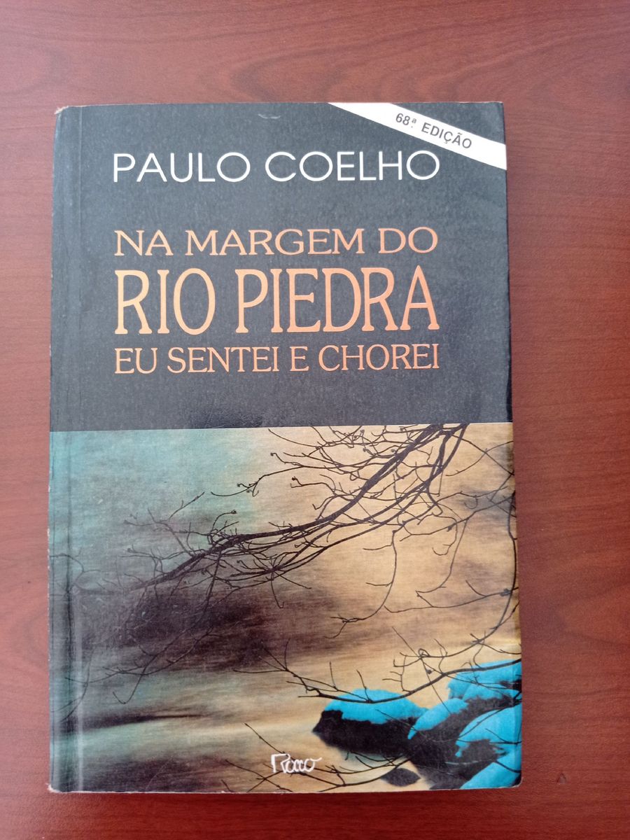 Livro Na Margem do Rio Piedra Eu Sentei e Chorei Livros Antigos
