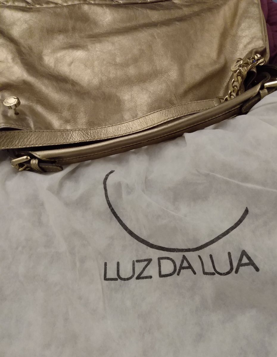 bolsa dourada luz da lua