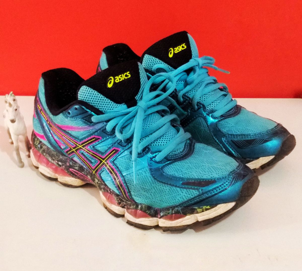 tênis asics para corrida