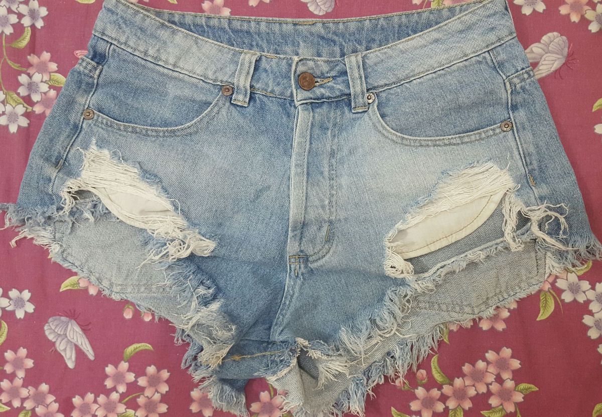 jeans claro rasgado feminino