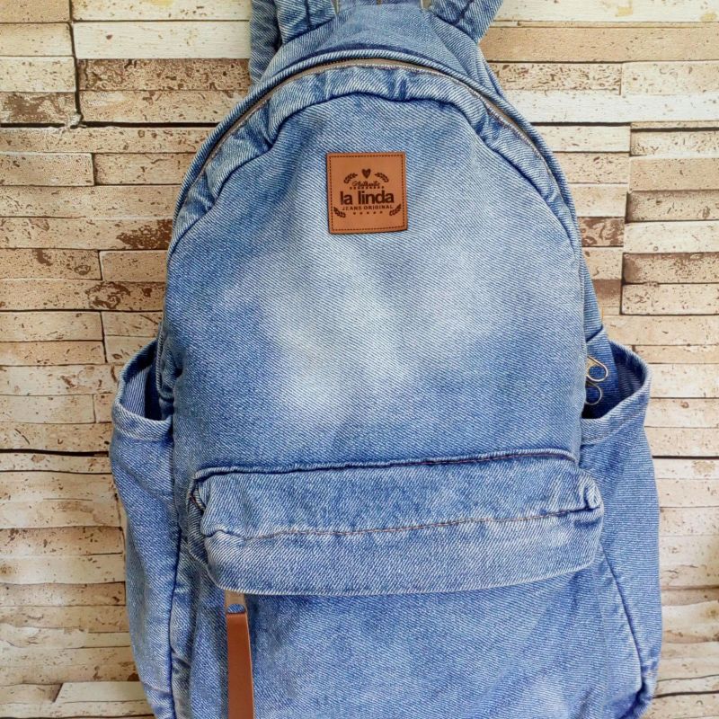 Mochila store jeans antiga