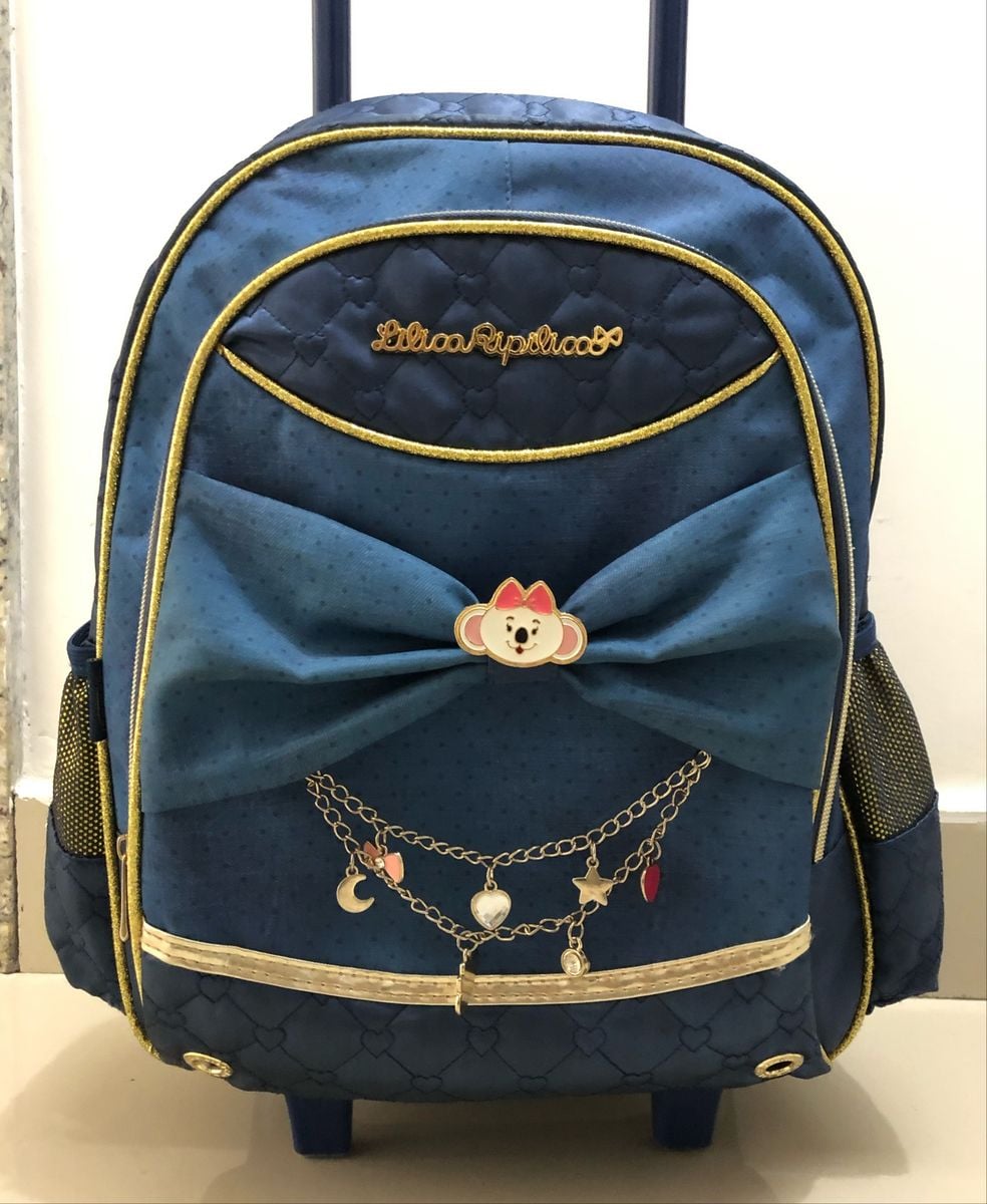 tenis rodinha lilica ripilica