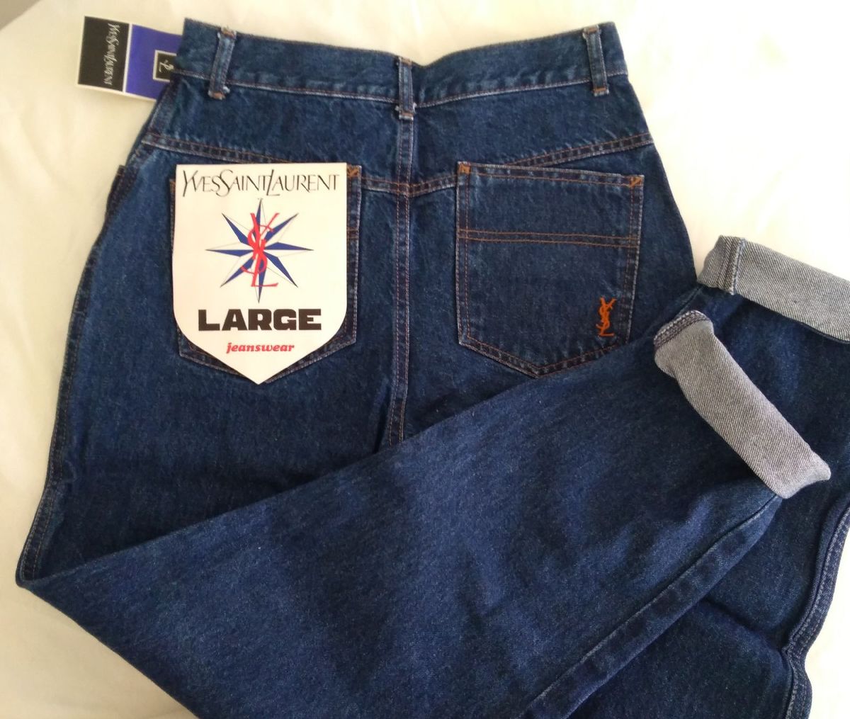 yves saint laurent calças jeans