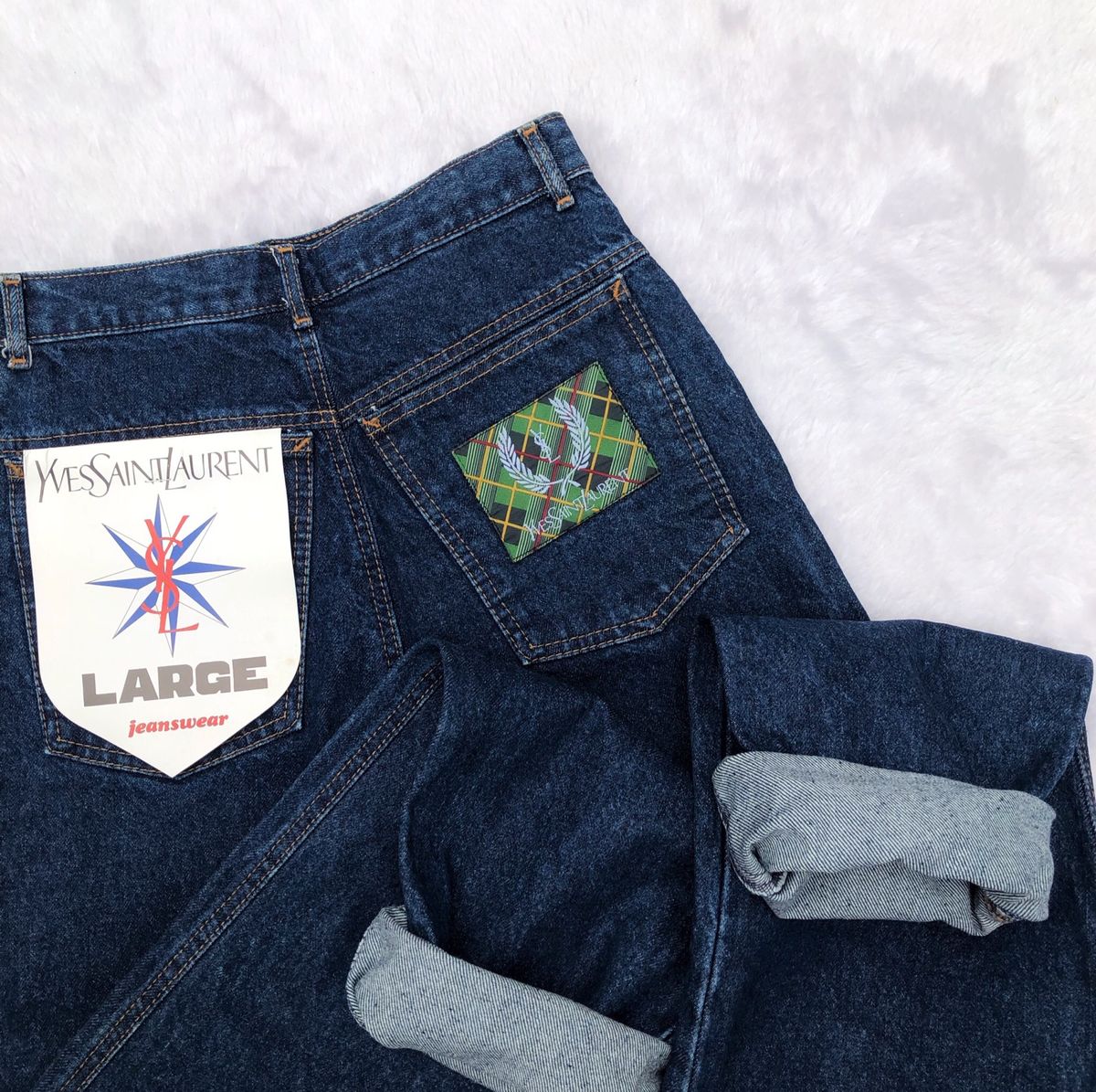 yves saint laurent calças jeans