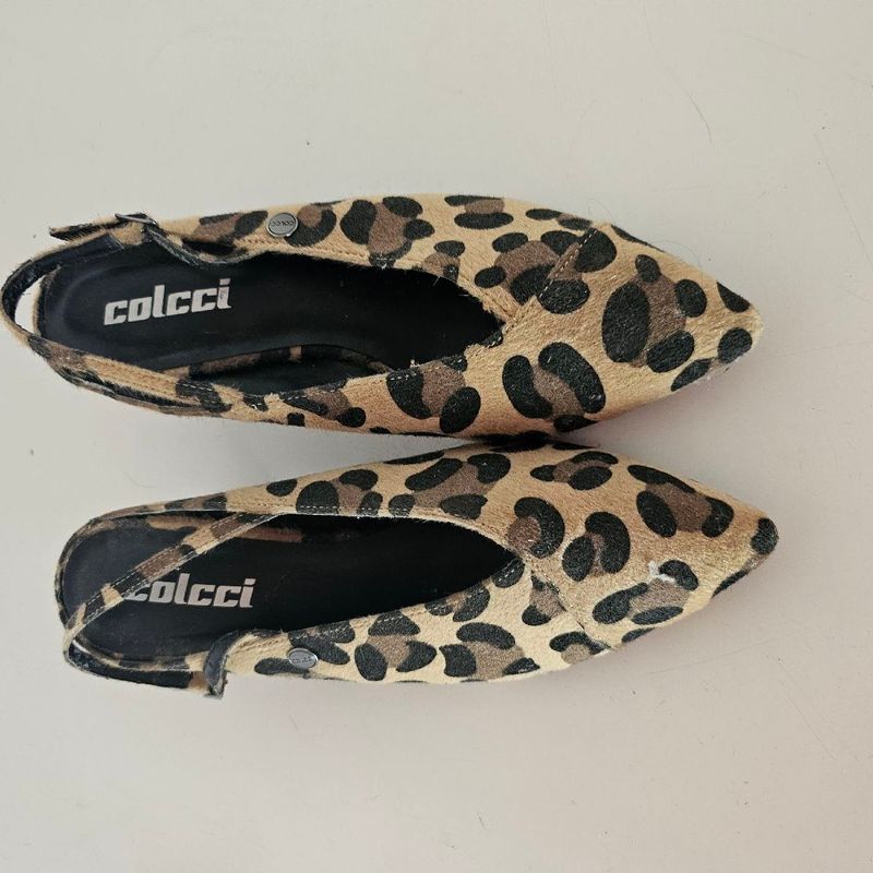 Slip on colcci sales onça