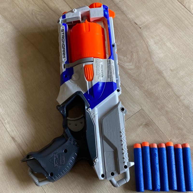 Nerf strongarm cheap por dentro