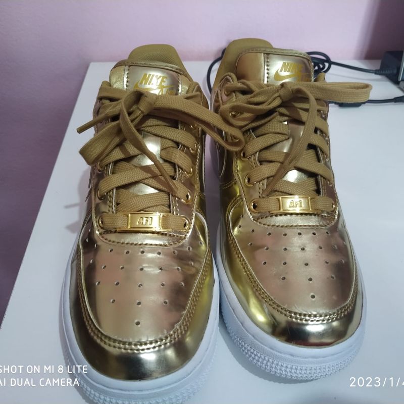 Gold high top store air force ones