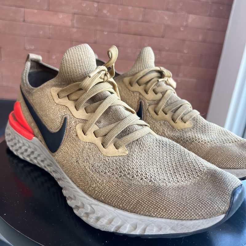 Nike epic react flyknit 2 store club gold