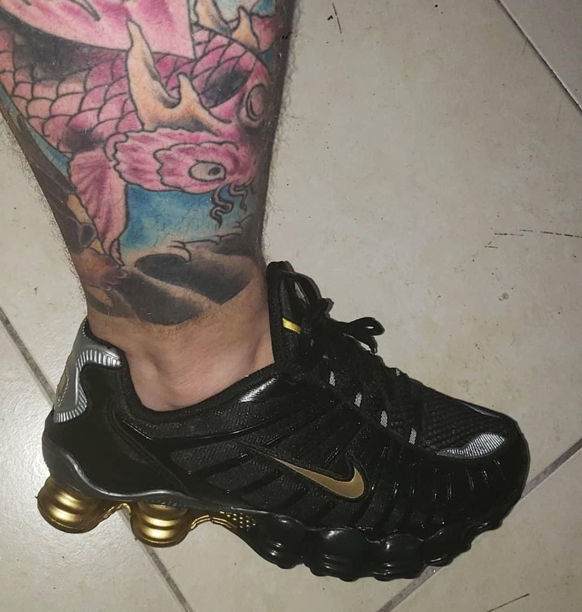 nike 12 molas preto e dourado