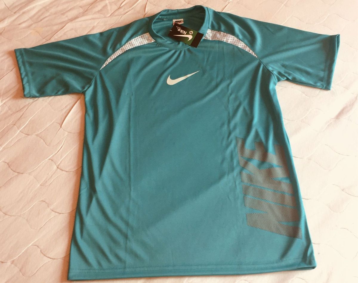 camiseta nike verde agua