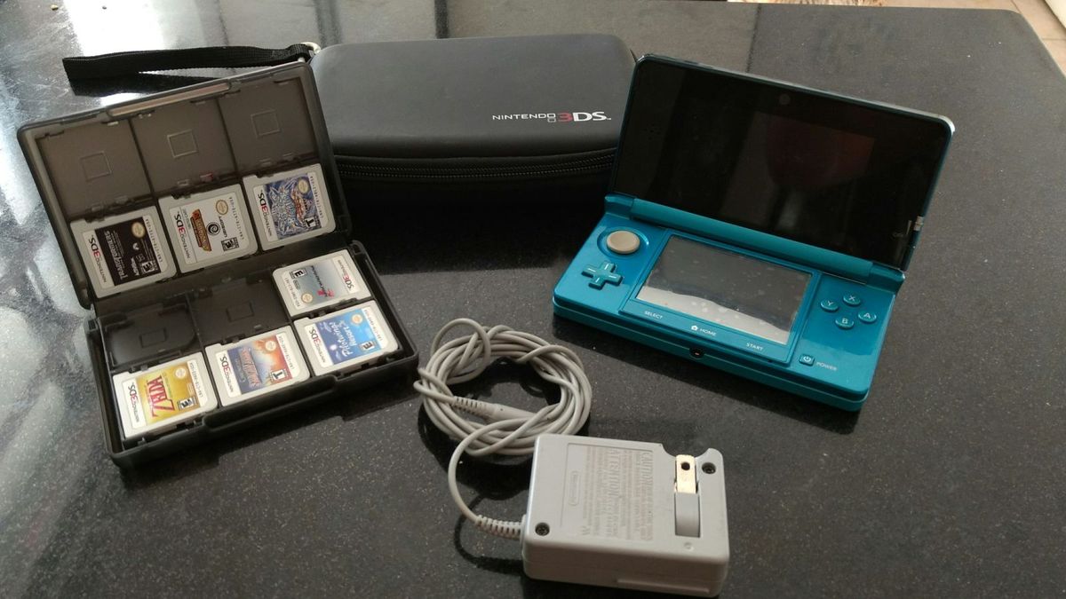 Nintendo 3ds + Case + 7 Jogos Console de Videogame Nintendo 3ds Usado 19423295 enjoei