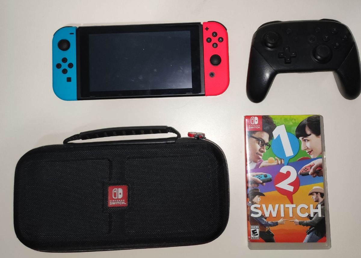 Nintendo Switch+ Pro Controller | Console de Videogame Nintendo Usado ...