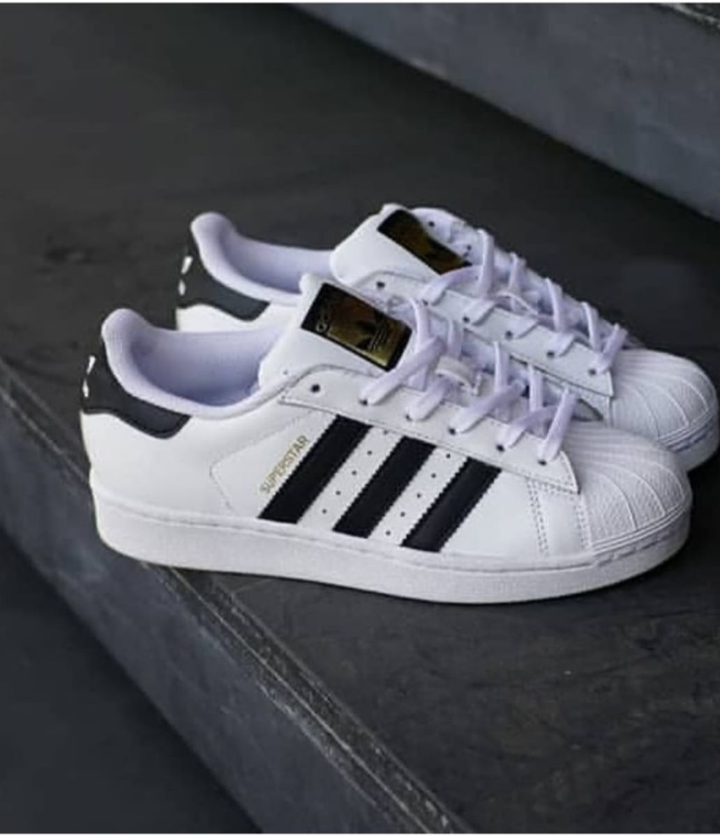 tenis adidas com tres listras