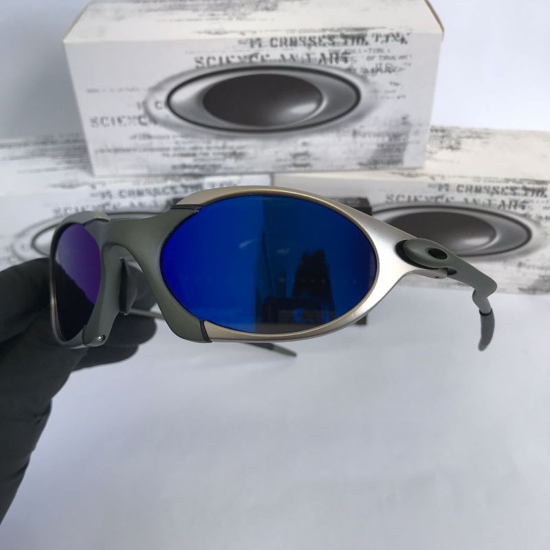 ÓCULOS DE SOL OAKLEY JULIET - LENTE AZUL DARK BLUE ARMAÇÃO CINZA