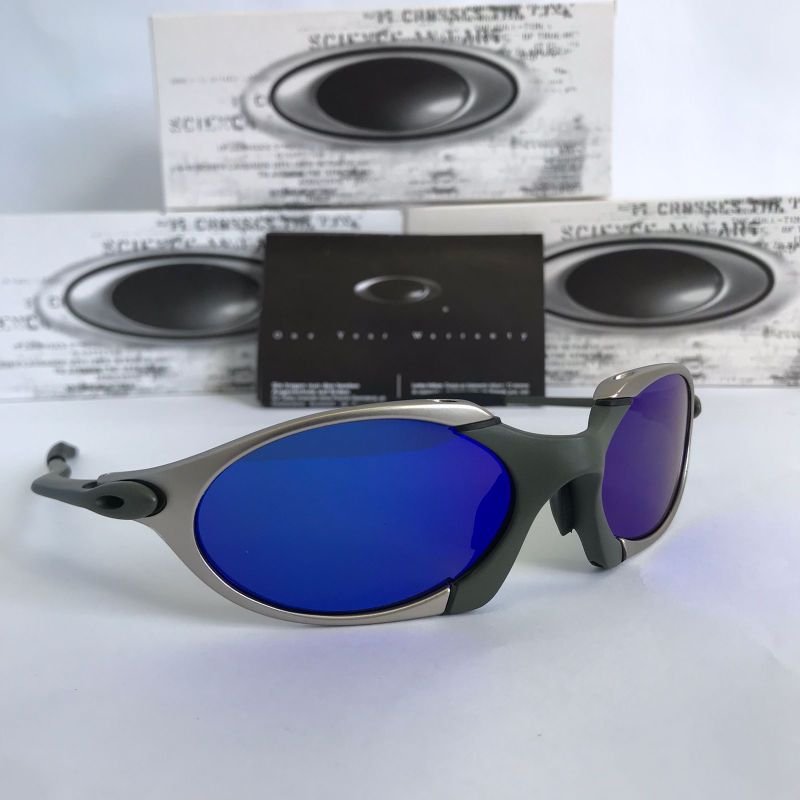 ÓCULOS DE SOL OAKLEY JULIET - LENTE AZUL DARK BLUE ARMAÇÃO CINZA