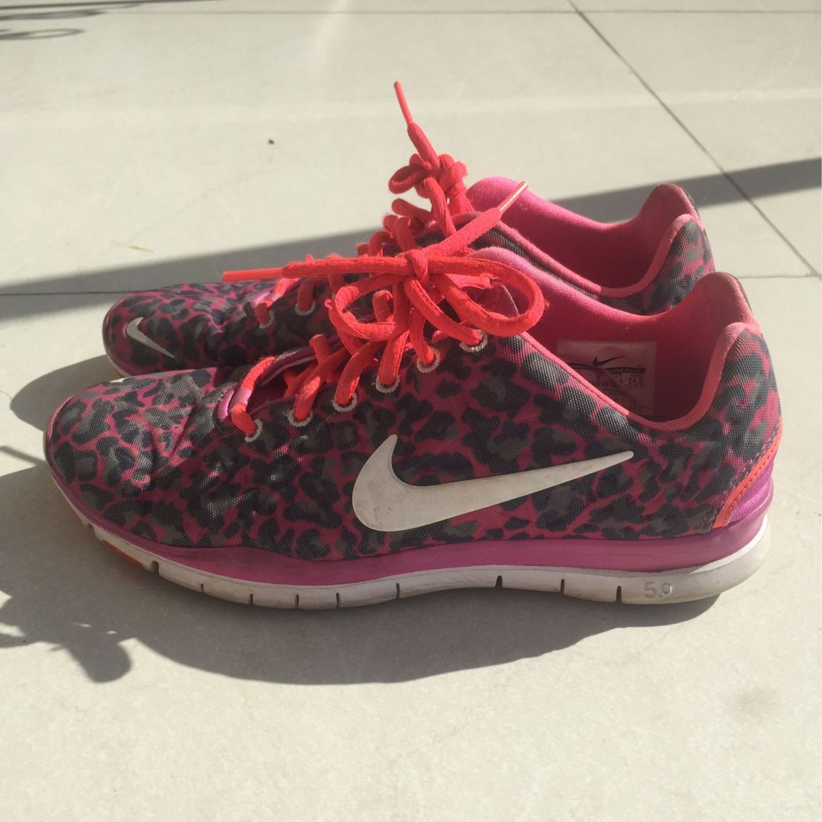 tenis nike onça