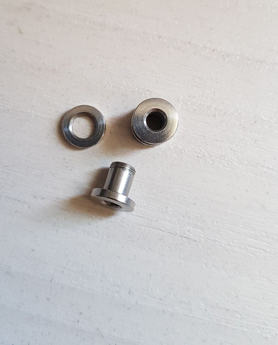 par de alargadores em metal cirúrgico, 5cm, excelente qualidade - bijoux hard core