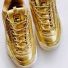 tenis fila disruptor dourado