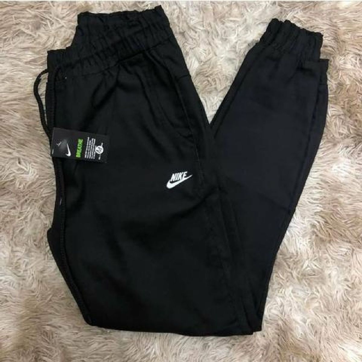 calça sarja nike