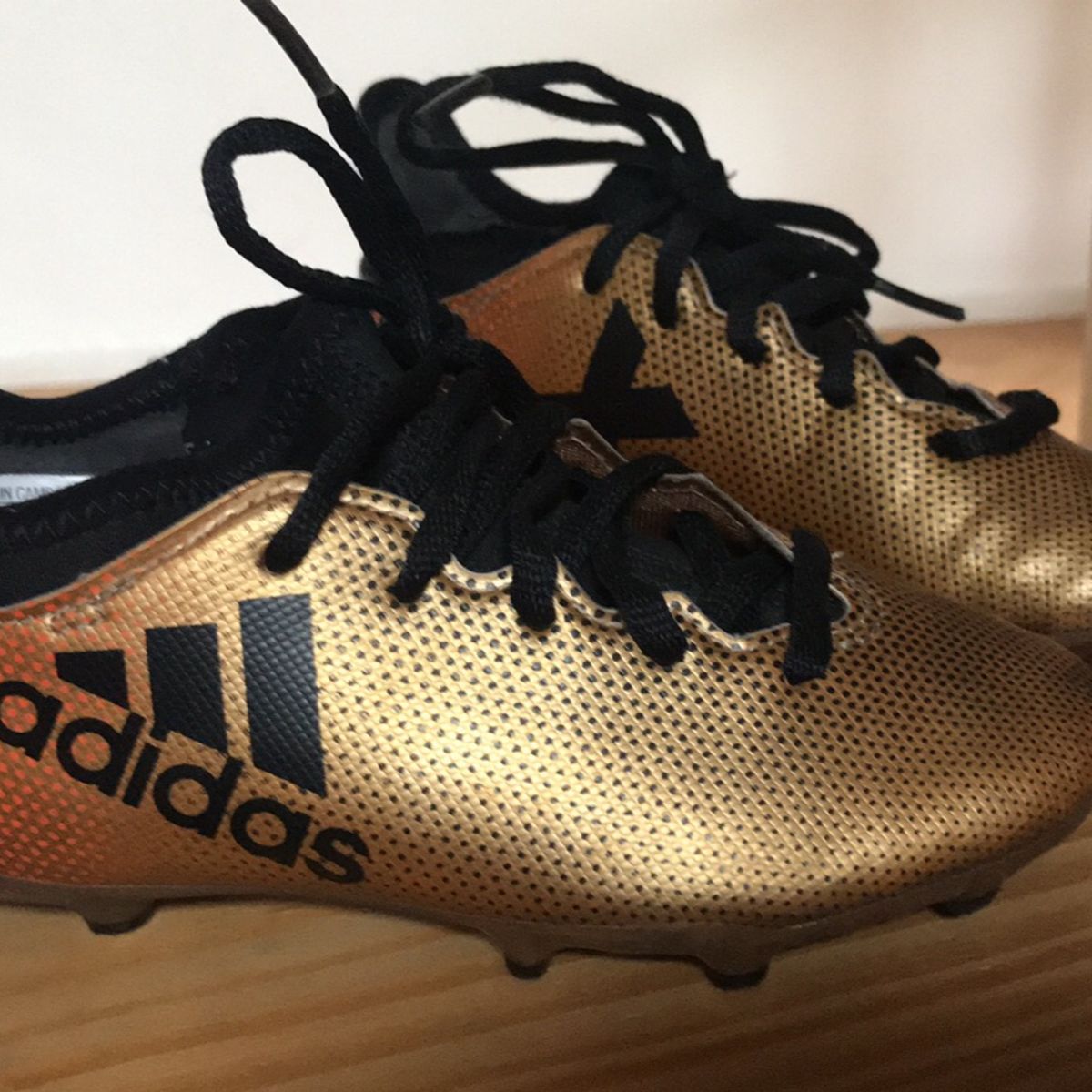 chuteira de cravo da adidas