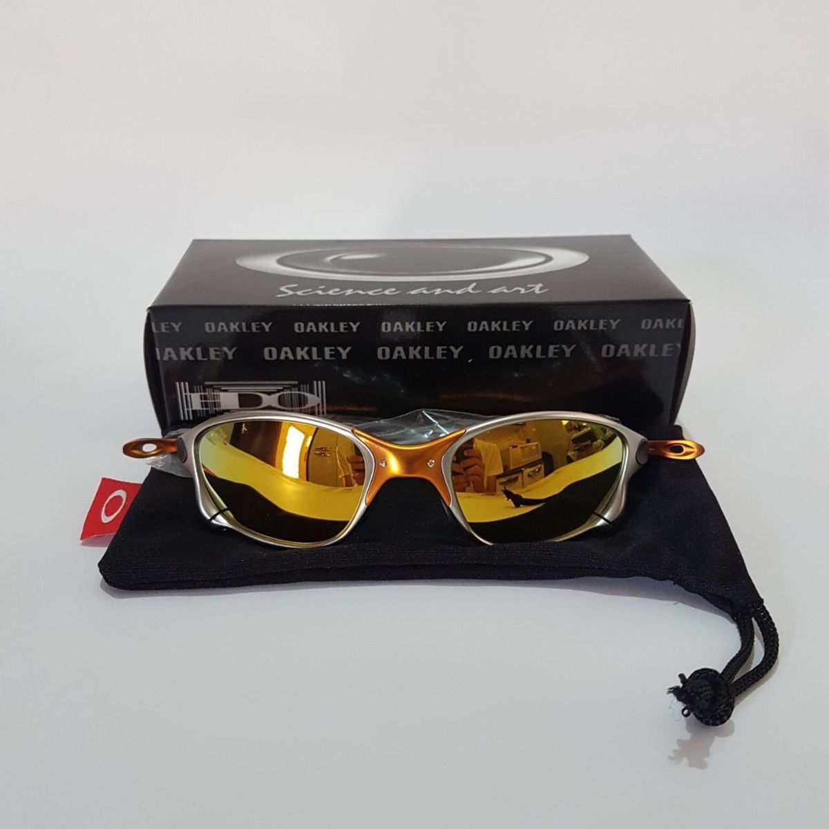 tenis oakley dourado