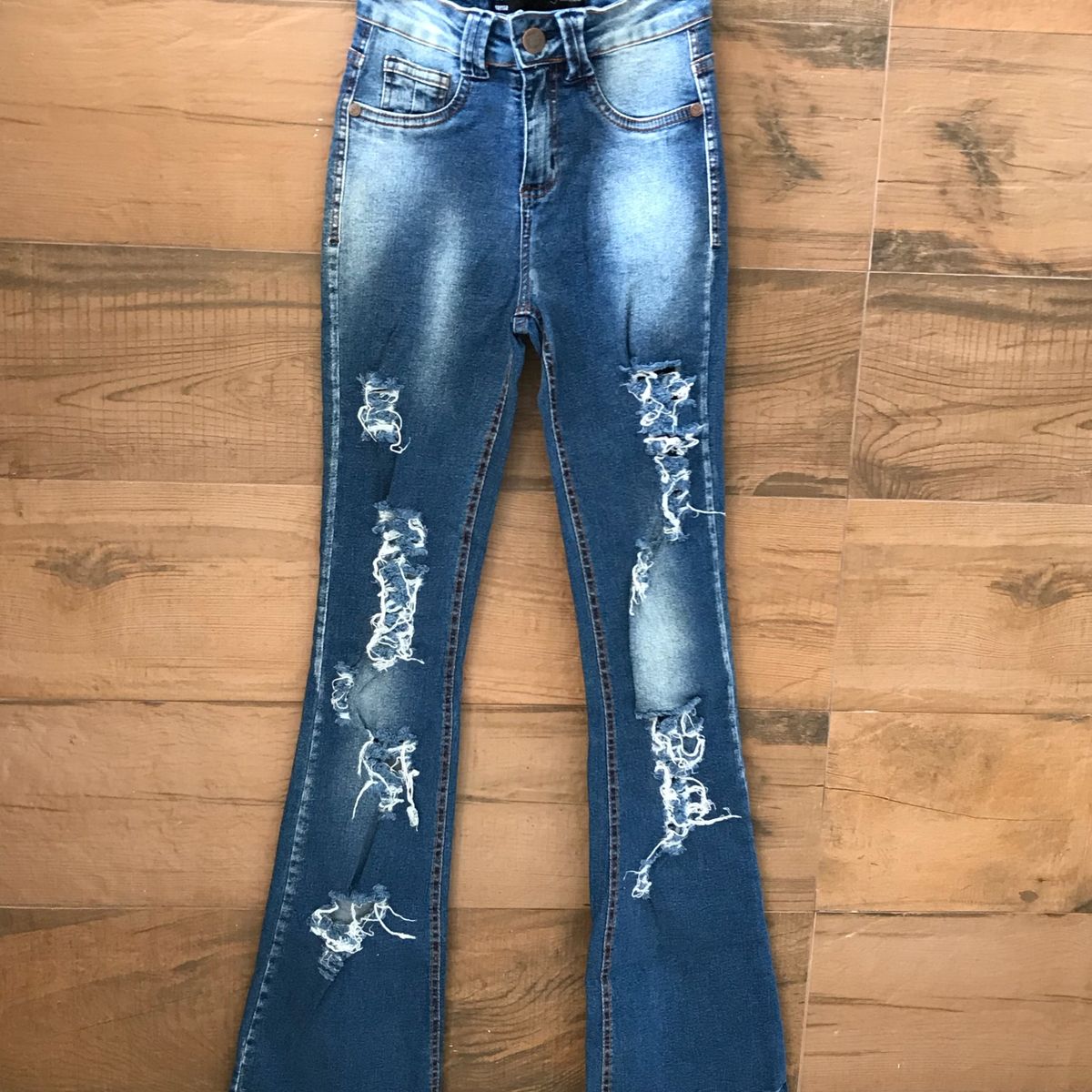 calça boca de sino marisa