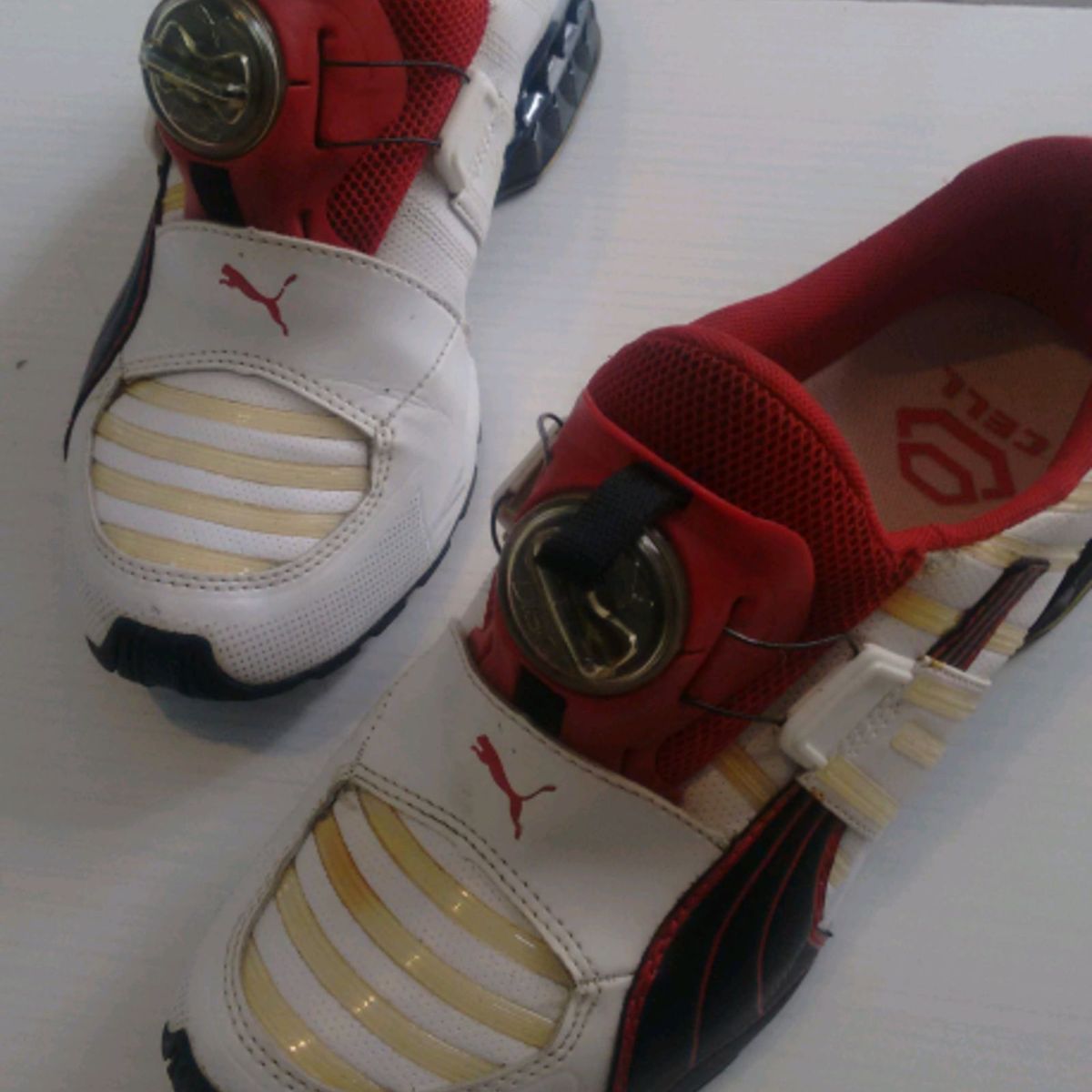 puma disk vermelho e preto